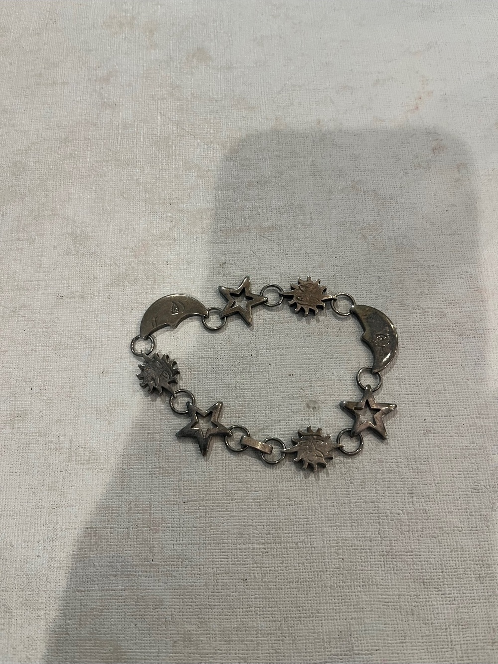 Vintage sterling silver Celestial Moon, sun, & Star Charm Bracelet. Marked.